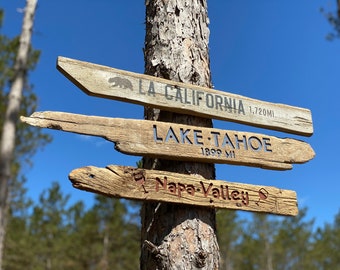 Random engraved directional Signs. Custom made destination signs.  Reclaimed wood beach signs. Vintage handmade travel signs.