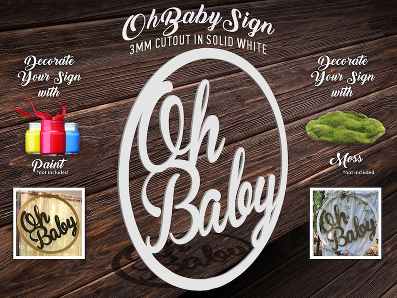 May include: White wooden "Oh Baby" sign with a 3mm cutout. The sign is in the shape of a circle and has a cursive font. The sign can be decorated with paint or moss.