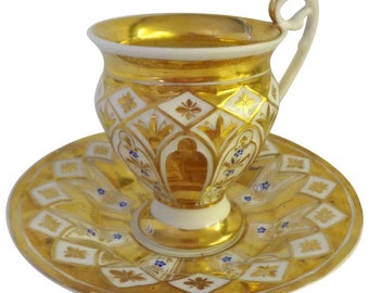 Spectacular KPM Gilded and Enamelled Large Cup and Saucer