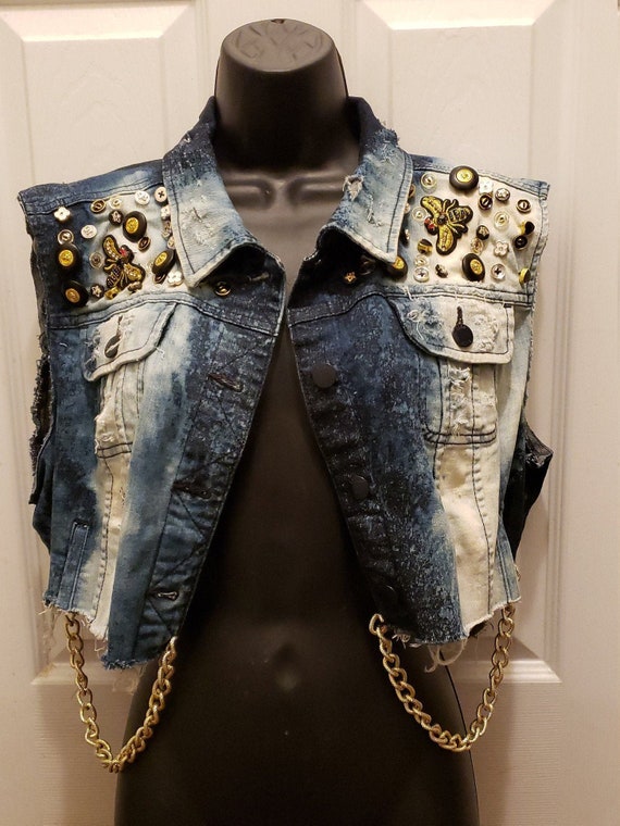 sleeveless blue jean jacket
