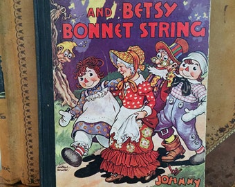 Raggedy Ann and Betsy Bonnet String by Johnny Gruelle-1943-USA