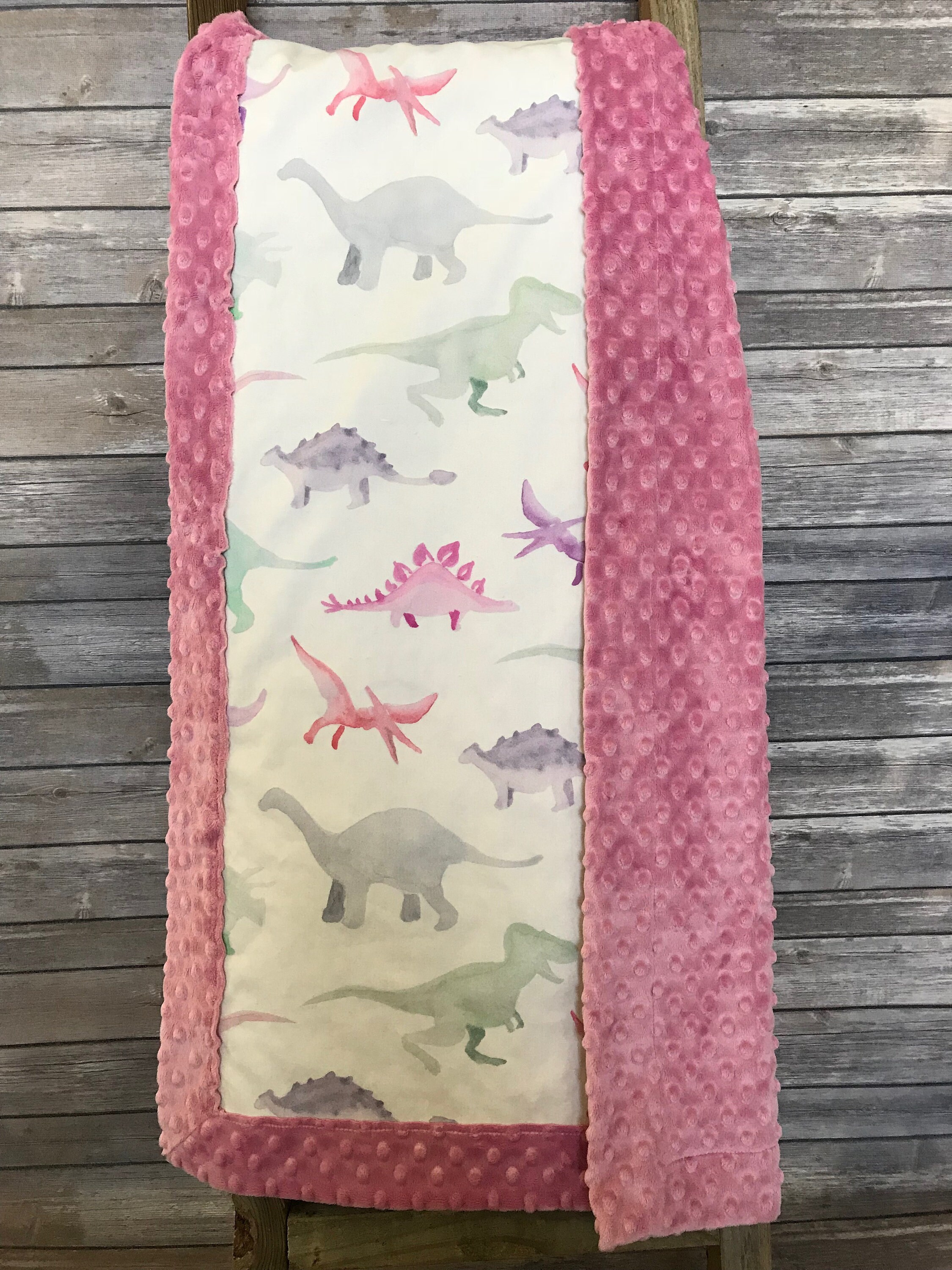 pink dinosaur blanket