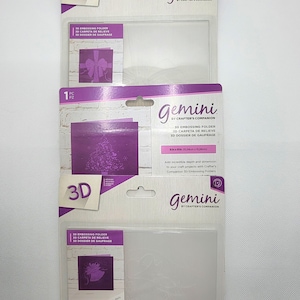 May include: A 3D embossing folder for crafting. The folder is packaged in a clear plastic sleeve with a purple and white label. The label says "Gemini by Crafter's Companion" and "3D Embossing Folder". The folder is 6x6 inches (15.24 cm x 15.24 cm).