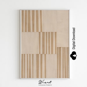 Può includere: Un download digitale di una stampa d'arte stampabile con un motivo geometrico di strisce verticali beige e marroni. La stampa è incorniciata in una cornice sottile argentata ed è appesa a una parete bianca. Il testo "Download digitale" è visibile nell'angolo in alto a destra dell'immagine.