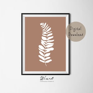 Può includere: Un download digitale di una stampa d'arte stampabile con una silhouette di felce bianca su uno sfondo marrone. Il testo "W.art Contemporary Printable Art" è in fondo alla stampa.