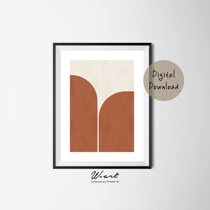 May include: Abstract digital art print with a beige background and two overlapping rust-colored shapes. The print has a modern minimalist style and is labeled "W.art Contemporary Printable Art".
