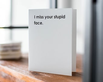 I Miss Your Stupid Face Greeting Card