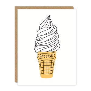 Puede incluir: Un cono de helado blanco con la palabra "CONEGRATS" escrita en el cono.