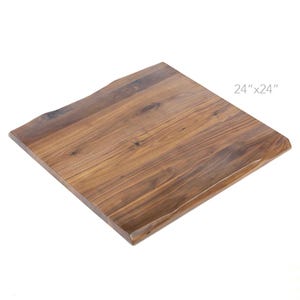 May include: A square wooden tabletop, measuring 61cm by 61cm, with a natural wood grain finish. The edges have a live edge design, giving it a rustic and unique appearance. The wood has a warm, brown colour.