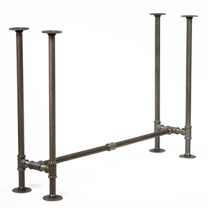May include: A metal table base with four legs and a crossbar. The base is made of black metal pipe and has a rustic finish.