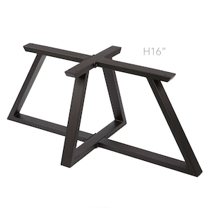May include: Black metal table base with a cross-shaped support and a height of 16 inches.  The base is made of four triangular legs.