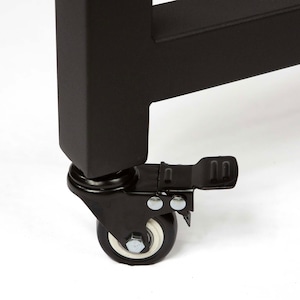 May include: Black metal table leg with a black caster wheel with a white tread and a black foot pedal.