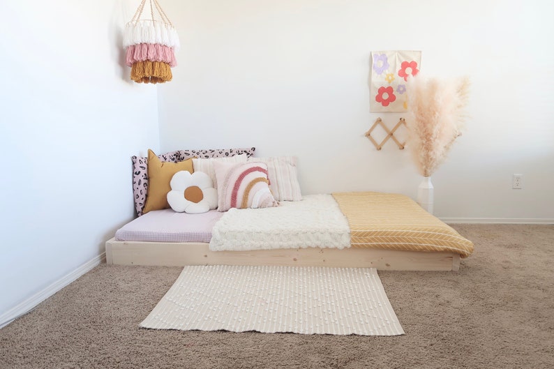 Low profile bedframe with raised slats included.