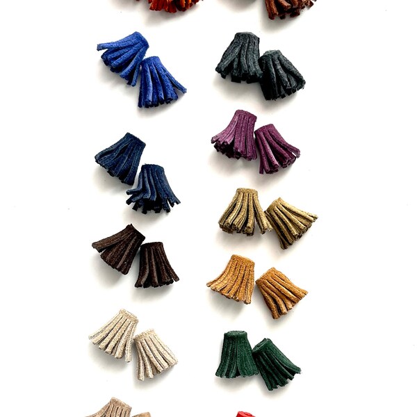 Pompons en cuir suédé taille 1 x 2 cm prix pour 2 pièces