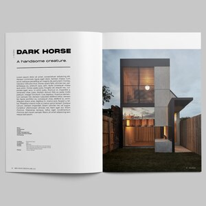 May include: A magazine spread featuring a modern home with a concrete and wood exterior. The home has large windows and a small yard with green grass. The text "DARK HORSE" and "A handsome creature." is printed on the page.
