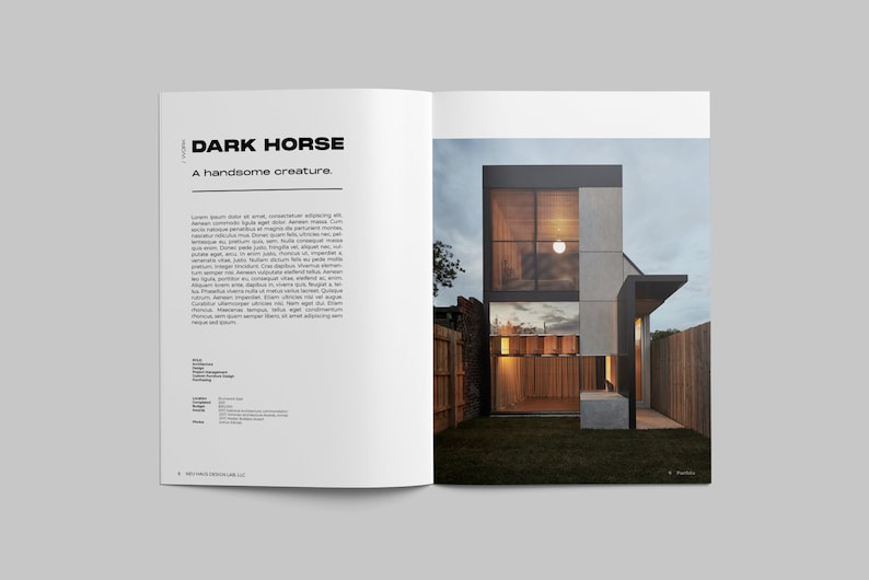 May include: A magazine spread featuring a modern home with a concrete and wood exterior. The home has large windows and a small yard with green grass. The text "DARK HORSE" and "A handsome creature." is printed on the page.