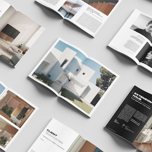 May include: A magazine spread showcasing interior design projects. The pages feature photos of modern homes with clean lines and natural light. The magazine also includes a table of contents, client testimonials, and information about the design team.