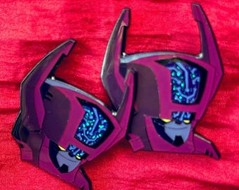 Pin de esmalte animado de Transformers: Director, realizado por el artista de doblaje Alexander Polinsky