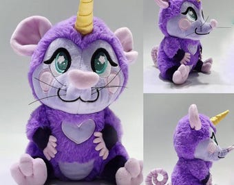 Muñecos de peluche y dijes de unicornio zarigüeya morados de Pawsums