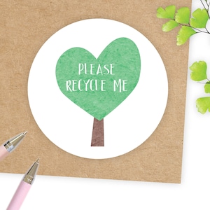 May include: A white sticker with a green heart-shaped tree and the text "PLEASE RECYCLE ME".