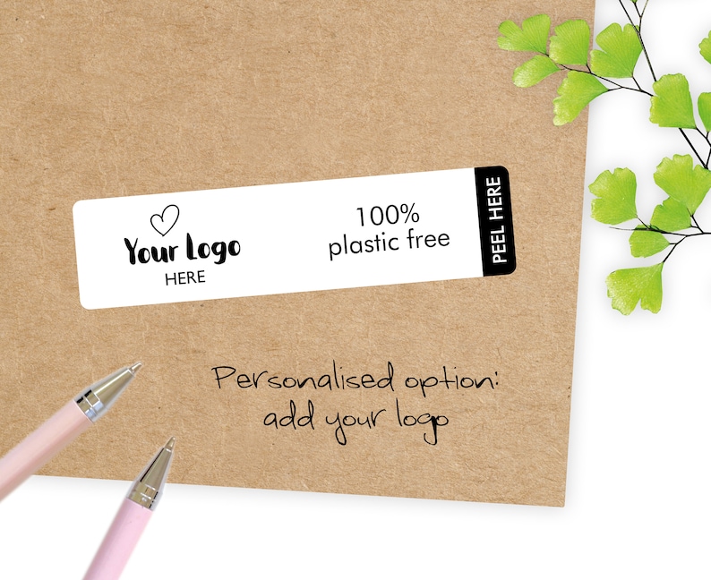 May include: A rectangular white label with the text "Your Logo HERE" and "100% plastic free" on a brown background. The label has a black border with "PEEL HERE" on the right side. The words "Personalised option: add your logo" are written below.