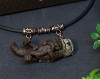 Necklace with two otters. Mother and baby otters hug each other. A wonderful gift for Mother's Day. Necklace for mom with realistic otters