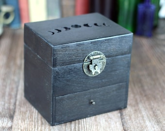 Moon phases black wooden apothecary chest with drawer for potions or essential oil storage box with 12 glass bottles, corks and labels