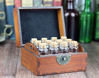 Wooden apothecary chest for potions or essential oil storage box with 12 glass bottles, cork stoppers and labels. Personalisation option.