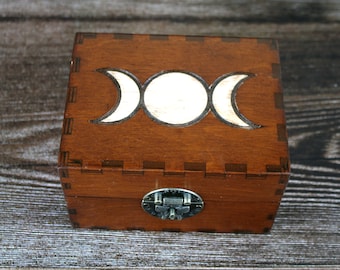 Triple Goddess Symbol engraved on a wooden apothecary chest for potions or essential oil storage box with 12 glass bottles, witch gift