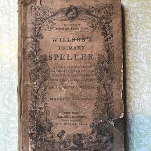 May include: A vintage book titled "Willson's Primary Speller" by Marcius Willson. The book is part of Harter's School and Family Series and was published by Harper & Brothers in New York.