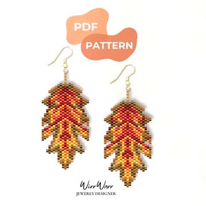 May include: A pair of beaded earrings shaped like oak leaves with a gradient of red, orange, yellow, and brown colors. The earrings feature gold-toned metal hooks. Above the earrings, a graphic displays the text PDF PATTERN in white letters.