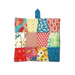 May include: A colorful patchwork pot holder with a variety of floral and geometric patterns in shades of red, blue, green, yellow, and white.