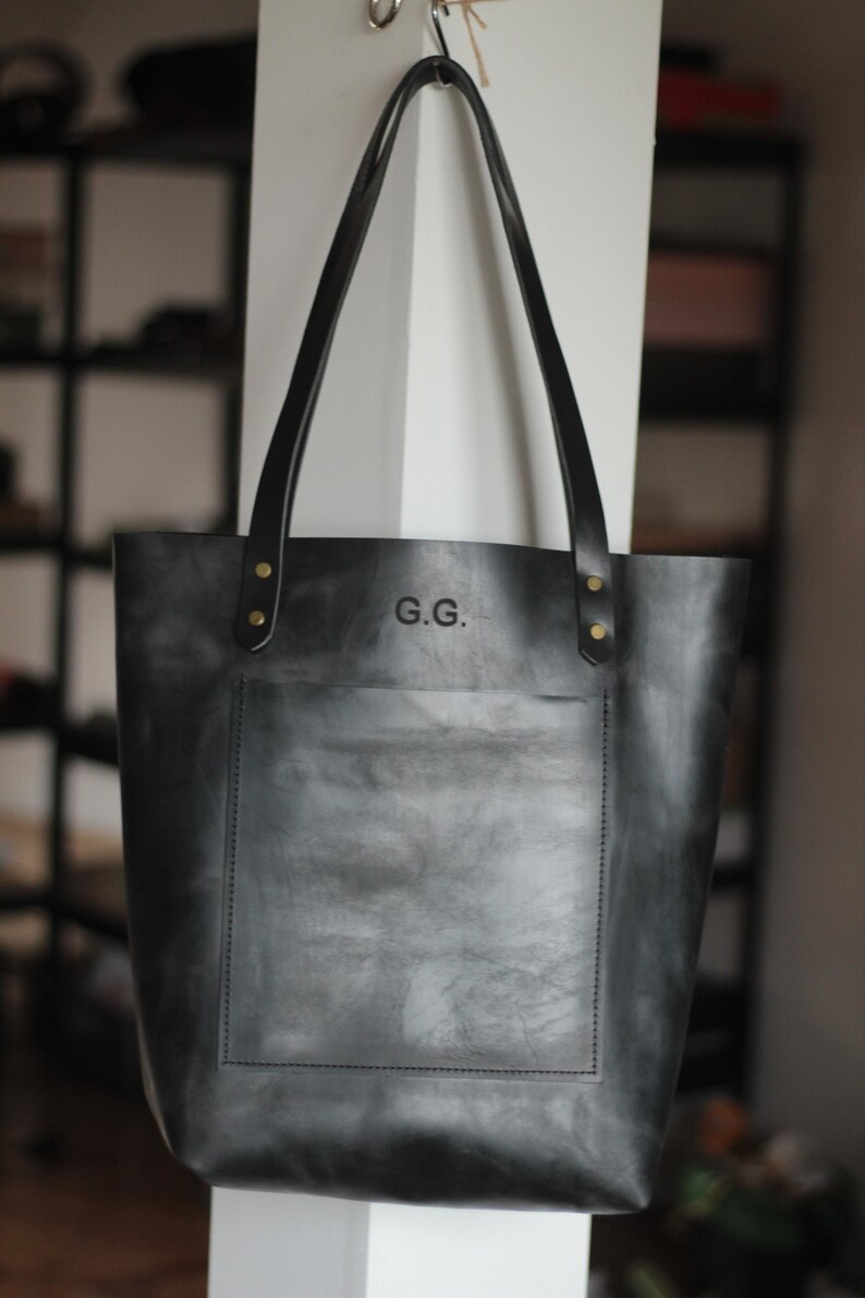Comparison image of three different sizes of personalized leather tote bags