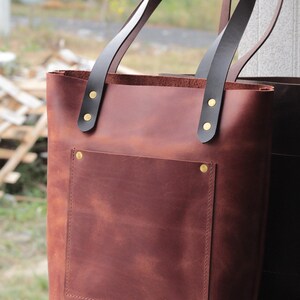 Durable vegetable-tanned leather tote bag that ages beautifully with personal use