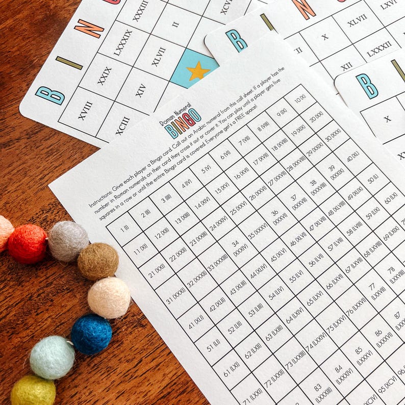 May include: A printable bingo card game with a colorful design. The card features Roman numerals and Arabic numerals. The game is called "Roman Numeral Bingo".
