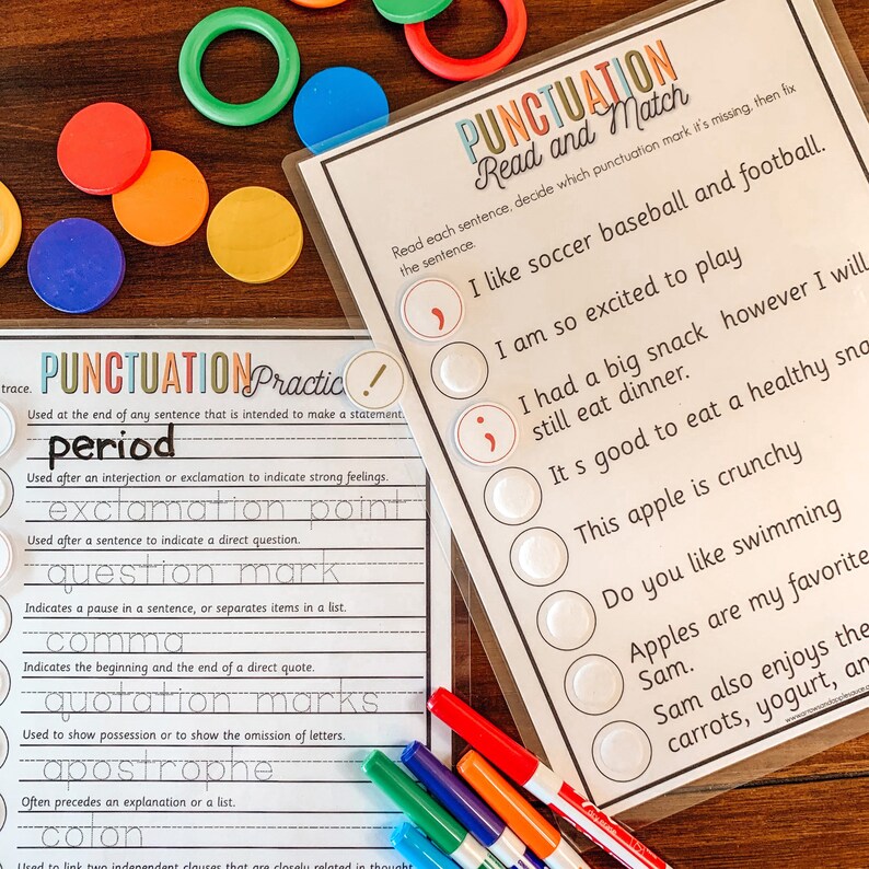 May include: A worksheet with a colorful chart explaining punctuation marks and their uses. The worksheet has a matching activity with sentences that need punctuation marks. The sentences are about sports, food, and activities.