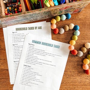May include: Two printable checklists for household chores, organized by age. The first checklist is titled "Household Tasks by Age" and lists chores for ages 2-3, 4-5, and 6-8. The second checklist is titled "Common Household Tasks" and lists daily and weekly chores.