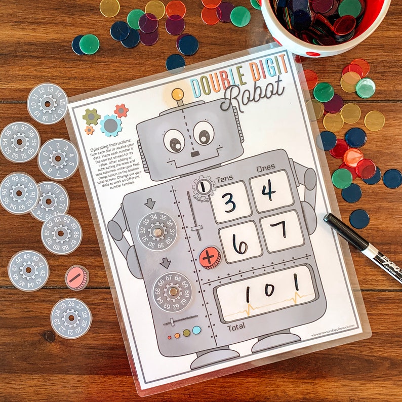 May include: A printable double-digit robot game for kids. The game includes a robot with a tens and ones place value chart, a plus sign, and a total box. The robot is gray with a red plus sign and a red heart beat line. The game is designed to help kids learn about double-digit addition.
