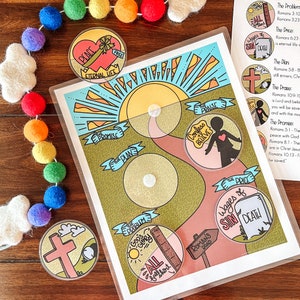 May include: A colorful illustrated game board with a path leading to a heart with the words "Confess & Believe". The game board includes circles with the words "The Promise", "The Plan", "God's Problem", "The Price", "All Fall Short", and "Roman's Road".