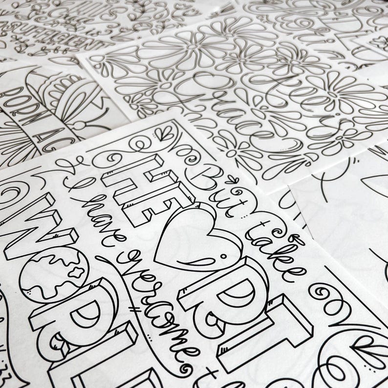 May include: A collection of black and white line art prints. The prints feature floral patterns and inspirational quotes, including the words "Born Again" and "The Best is Yet to Come". The designs are suitable for coloring.
