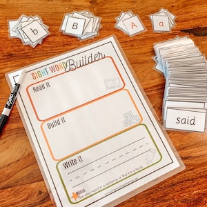 May include: A printable worksheet with the title "Sight Word Builder" and instructions to "Read it", "Build it", and "Write it". The worksheet includes a blank space for writing and a bonus section that encourages using the word in a sentence or finding it in a book. The worksheet is surrounded by a stack of flashcards with letters and sight words.