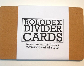 May include: A pack of brown card dividers with white text that reads "ROLODEX DIVIDER CARDS because some things never go out of style."