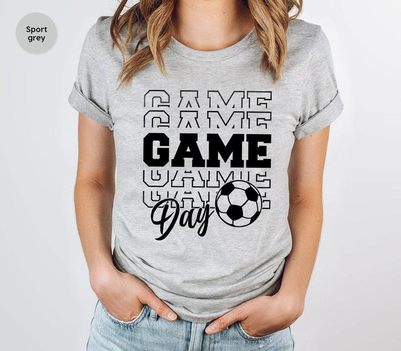 a woman wearing a t - shirt with a game on it