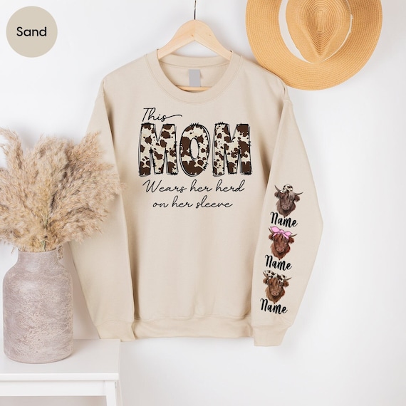 Custom Mom Cow Tees and Sweaters, Mother's Day Gift, Cow Print Mama Sweatshirt, Farmer Hoodie, Mom Loves Her Herd On Her Sleeve, SL556