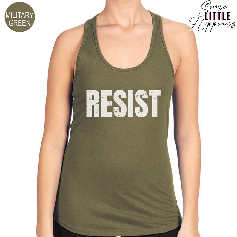 May include: A green tank top with the word "RESIST" printed in white on the front.