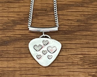 Handmade silver heart stamp detailed necklace, unusual silver heart stamp detail necklace, guitar pick shaped heart detail necklace