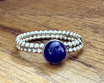 Amethyst ring on a double beaded silver band, Size M