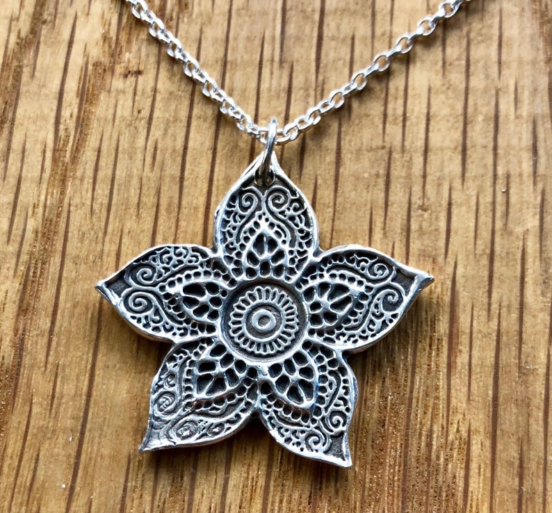 spinning Mehndi Beautiful Handmade Silver Henna Flower pendant and drop spinning earring set spinning earrings earrings silver henna