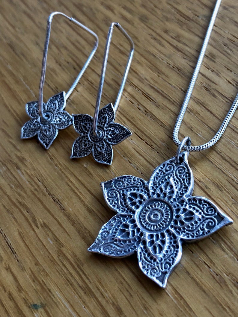 spinning Mehndi Beautiful Handmade Silver Henna Flower pendant and drop spinning earring set spinning earrings earrings silver henna