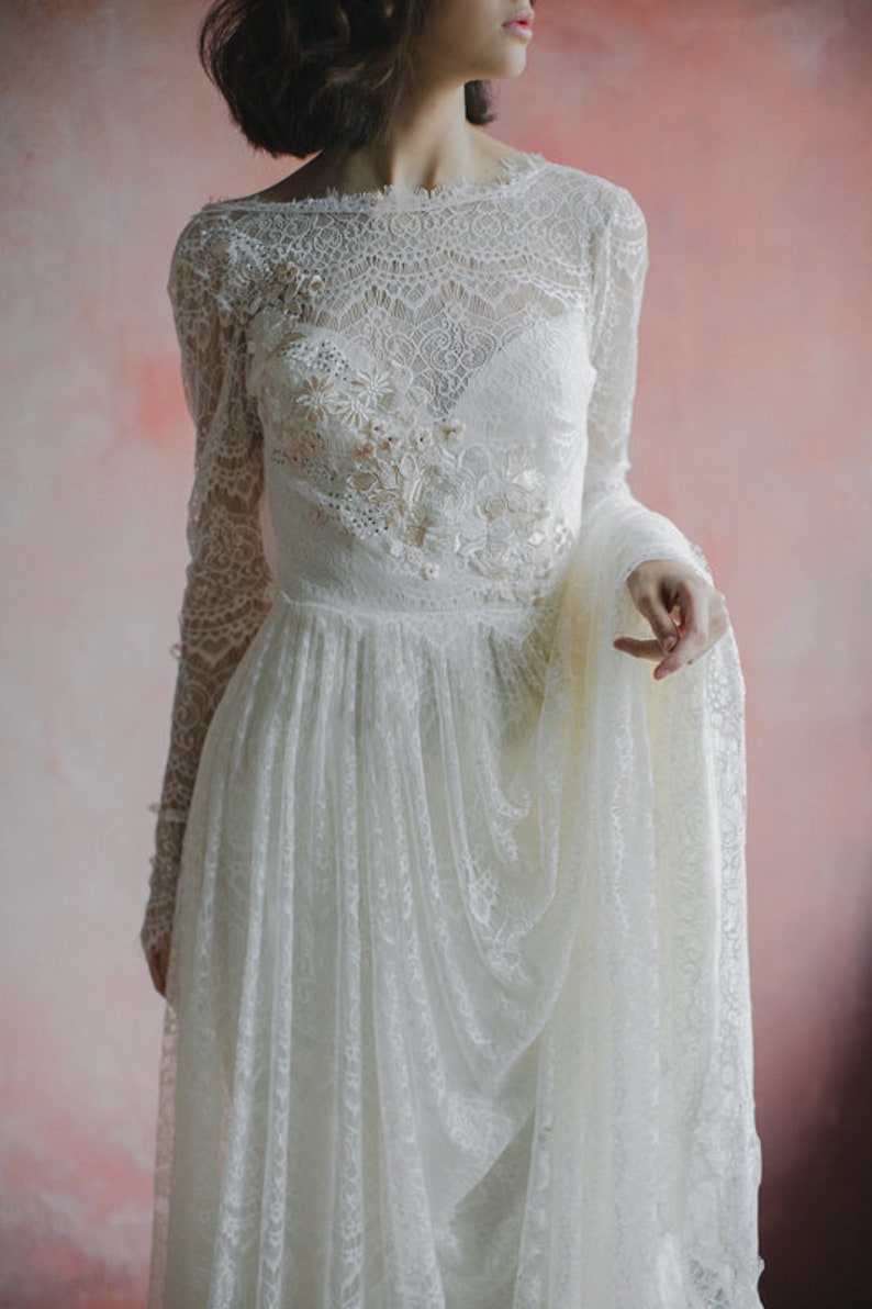 fitted lace wedding dress with open back